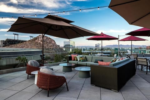 Take in iconic surroundings from the rooftop pool edge.