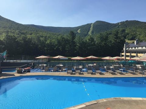 Enjoy serene moments by the pool with stunning mountain views as your backdrop, making it an ideal place for relaxation and recreation.