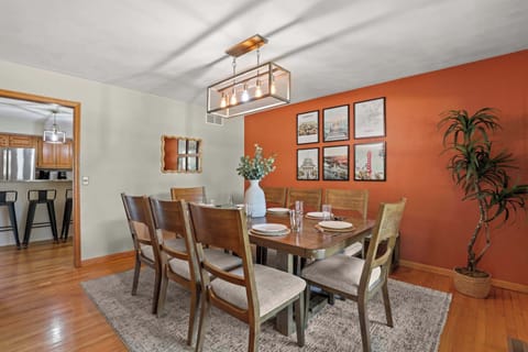 View from the front door - Formal dining room that can comfortably seat 8. There is a pull up bench that can seat another 3 people. The dining room is off the kitchen, which also has 4 seats at the island.