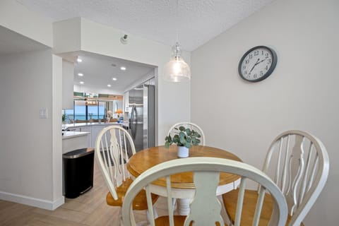 Breakfast nook off the kitchen with balcony access