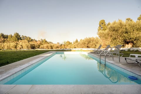Private pool villa in Halkidiki-olive trees-sunbeds, serene garden-total privacy