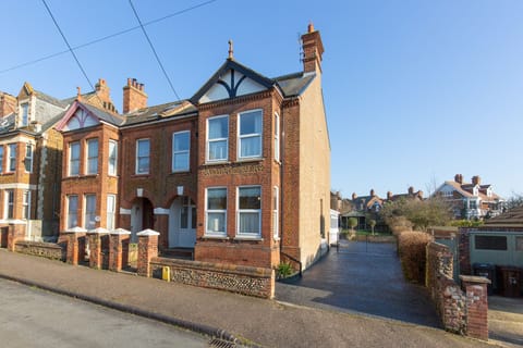 Front of house with driveway parking for 2 cars