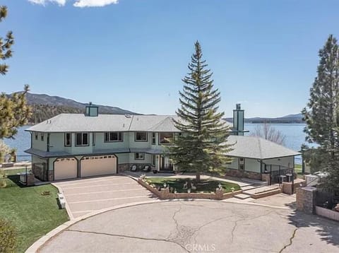 Front of house - Front of house with large driveway and garage access