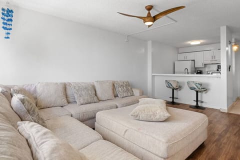 Spacious open-layout living area that flows seamlessly from the kitchen to the lounge—perfect for relaxing or entertaining.