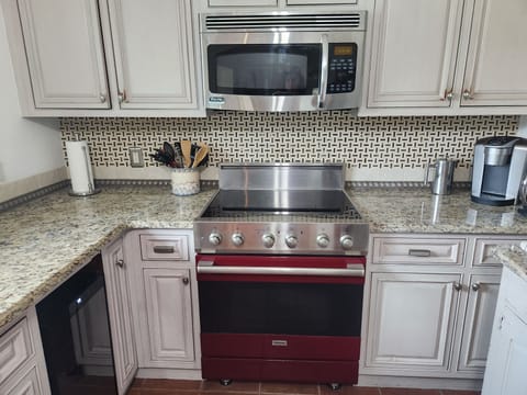 Well-appointed kitchen with custom cabinetry and Viking appliances