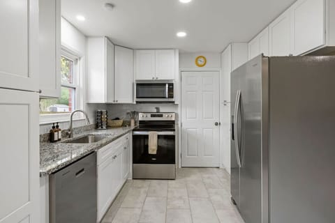 Fully stocked kitchen with modern appliances and everything you need to cook, dine, and feel right at home.