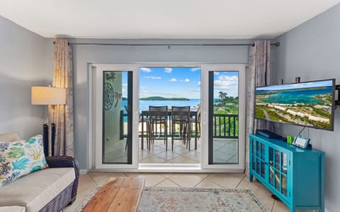 Open-concept living space with cozy seating and vibrant décor—ideal for family gatherings or quiet evenings.