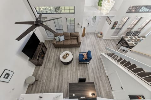 Spacious open-concept living room perfect for relaxing or game nights.