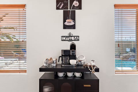 Start your mornings right with a fully stocked coffee and tea station, ready for your brew.