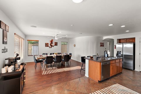 Cook, dine, and connect in this open-concept kitchen and dining space built for groups.