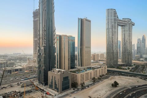 City View: Experience breathtaking vistas of Dubai's stunning skyline from your window!