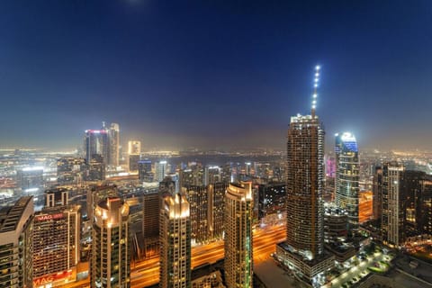 Skyline View: Revel in breathtaking city lights from your private balcony !