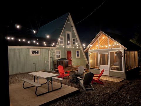 Fire pit and outdoor screened in patio