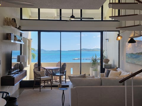 Spacious, sunlit living — open the doors and let the Caribbean breeze in.
