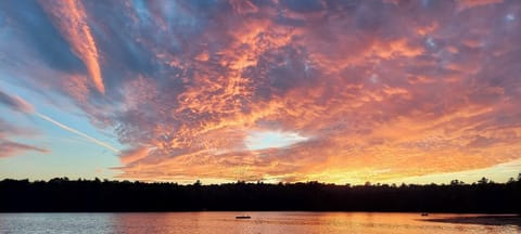 View of clear lake at sunset.
