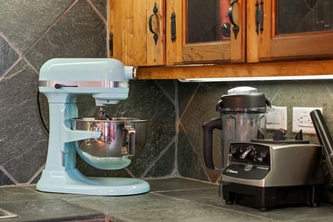 Signature “A Stay Above The Rest” KitchenAid mixer and Vitamix blender—perfect for gourmet cooking, baking, and smoothies.