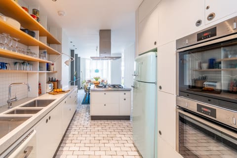 Ground floor: Kitchen with a double oven, ideal for preparing multiple dishes at once