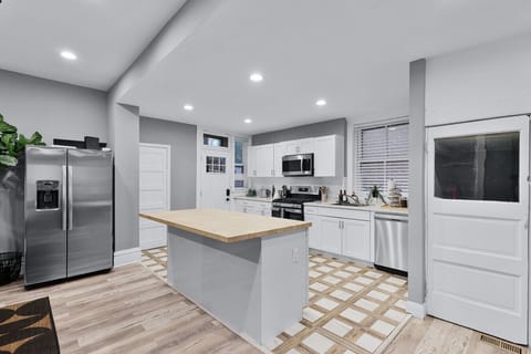 Sleek and modern with ample prep space, perfect for culinary adventures and casual gatherings!