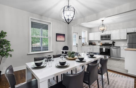 Our dining area comfortably accommodates eight guests and comes with a complete setup, including utensils and a thoughtful selection of children's dinnerware.