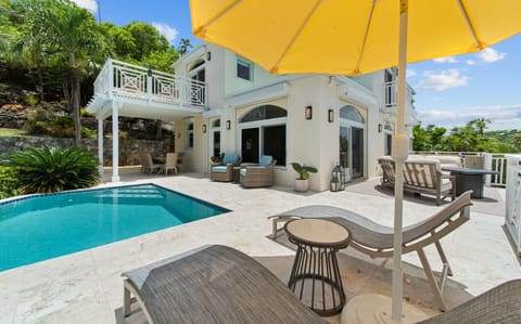 Private pool with loungers, shaded seating, and full sun for that Caribbean tan you've been craving.