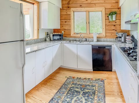 The pass through window opens up to the dining area