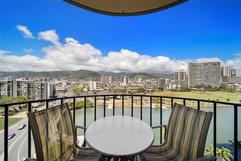 Balcony with coffee table and chairs
