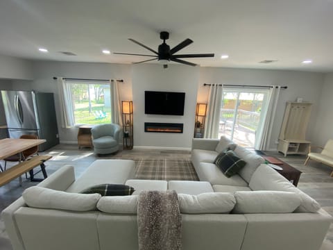 Living Room with fireplace and smart Roku TV. 