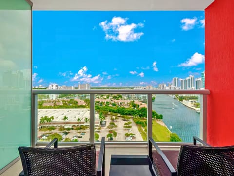 Stylish balcony with outdoor seating — ideal for sipping your morning coffee or unwinding at sunset.