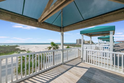 Step onto your private covered balcony and soak in breathtaking ocean views stretching to the horizon.