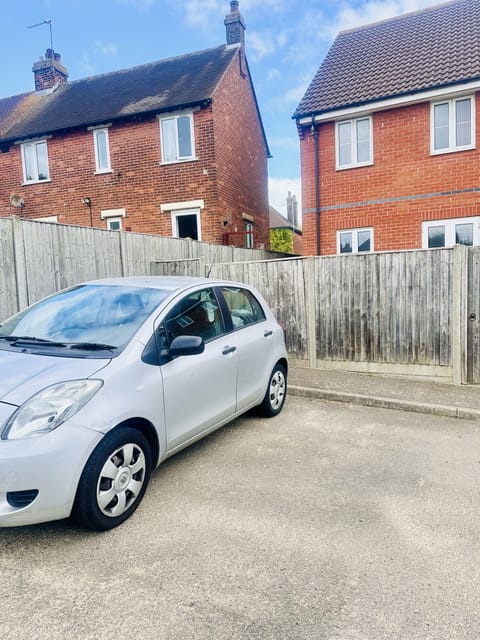 One allocated parking where silver car is parked - access through back garden