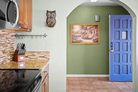 You'll feel right at home the moment you walk in. Take in the artwork all around you and the colorful touches throughout the home.