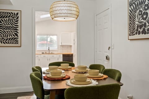 Chandelier and table set up for the dining area
