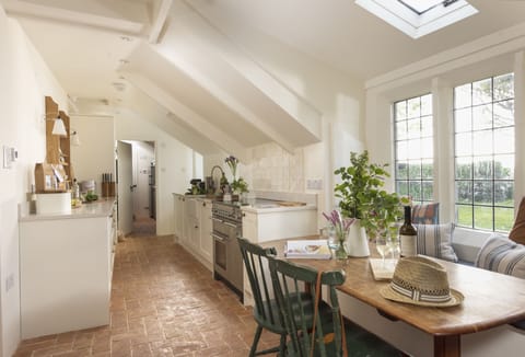 Besloe, Tintagel. Ground Floor: At the heart of the home is a well-equipped kitchen where modern convenience meets rustic charm