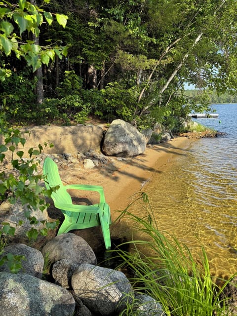 Private water access with sandy beach area.