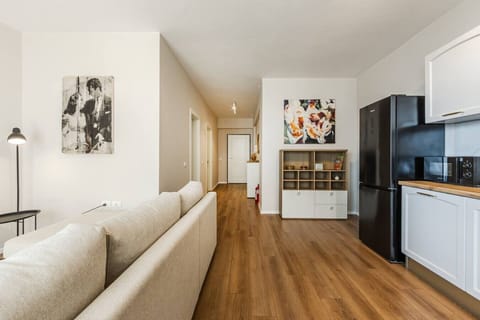Living room and fully-equipped kitchen