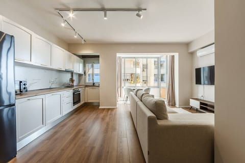 Living room and fully-equipped kitchen