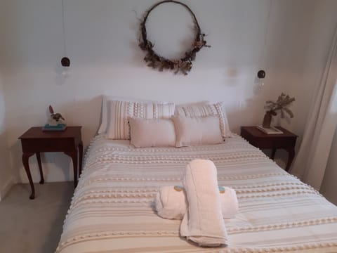 Queen bedroom with electric blankets, blackout curtains for a beautiful rest.