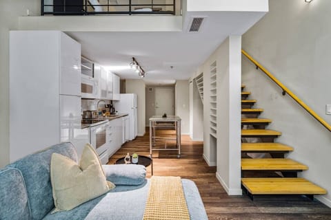 You feel a sense of continuity as you climb the stairs, moving seamlessly between the different levels of the home.