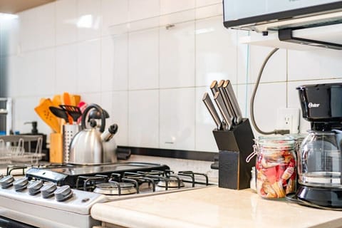 Clean kitchen counter highlighting modern surfaces and thoughtful appliance placement.