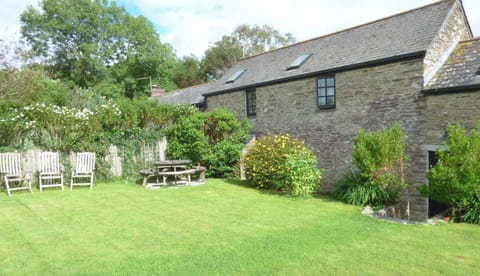 Meadow Cottage private garden overlooking a 5 acre natural meadow