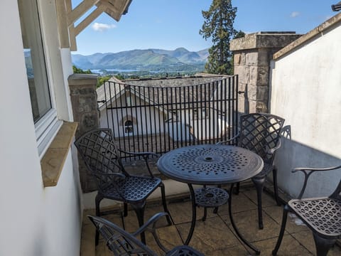 Patio with view over Keswick, Lake Derwent and mountains beyond