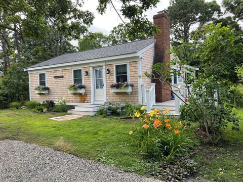 Front of cottage - Driveway fits three cars. We love our window boxes!