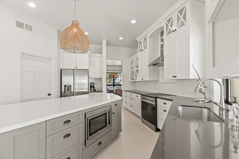 Plenty of kitchen space with new appliances and walk-in pantry