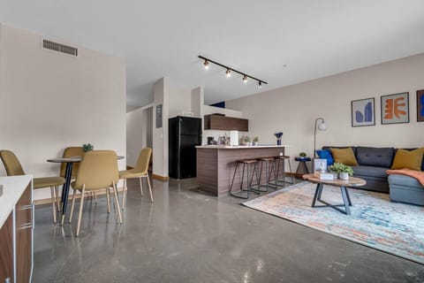 An open-concept area featuring a modern furnishings, and a stylish entertainment setup—ideal for gatherings and relaxation.