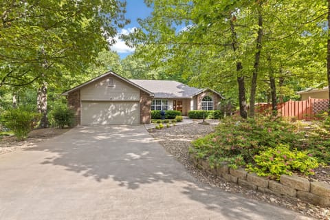 Guests can park 1 car in the garage and up to 4 cars in the driveway.