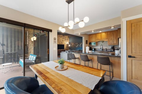 The adjacent dining area seats up to 4.