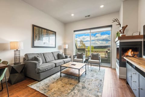 Enjoy the living area watching TV or relaxing by the fireplace