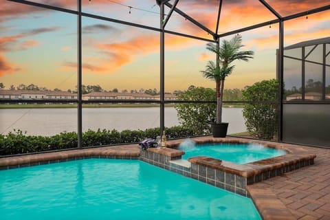 Start your day with coffee or end it with dinner at the outdoor table, then lounge with a book in the sun, soak in the soothing 99° spa, and finish with a fun game of pool basketball on your private lakefront deck - have drink at the tiki bar.