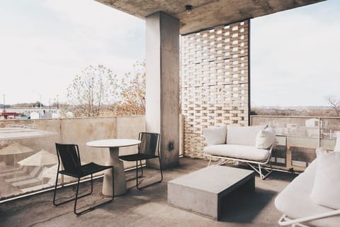 Breathe in fresh air on a spacious terrace lounge.