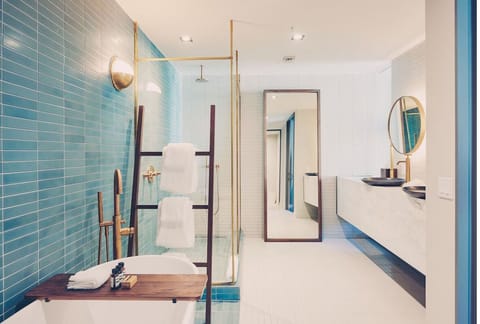 Refresh in a spa-like bath with sleek rainfall shower.